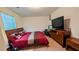 Bedroom featuring carpet and TV at 15 Regal Ln, Covington, GA 30016