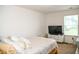 Well-lit bedroom with a plush carpet and natural light at 15 Regal Ln, Covington, GA 30016