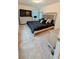 Cozy bedroom featuring a large bed, TV, neutral carpet, and ample natural light at 15 Regal Ln, Covington, GA 30016