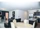 Spacious kitchen with dark wood cabinets, stainless steel appliances, and a breakfast bar at 15 Regal Ln, Covington, GA 30016
