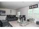 Inviting living room with comfortable seating, open layout, and bright windows at 15 Regal Ln, Covington, GA 30016