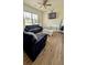 Stylish living room with modern sofa, loveseat, and natural light at 15 Regal Ln, Covington, GA 30016