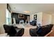 Contemporary living room featuring stylish seating, sleek decor, and ample space for relaxation at 15 Regal Ln, Covington, GA 30016