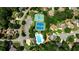 Aerial view of community amenities including pool, tennis courts and playground at 215 Settindown Ct, Roswell, GA 30075