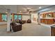 Finished basement with a bar area and seating, perfect for entertaining guests at 215 Settindown Ct, Roswell, GA 30075
