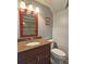 Bathroom features granite countertop vanity, wood cabinets, tile flooring and shower at 215 Settindown Ct, Roswell, GA 30075