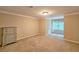Bedroom features carpeted floors, ceiling fan and window at 215 Settindown Ct, Roswell, GA 30075