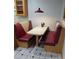 Cozy kitchen nook with booth seating and a view from the window at 215 Settindown Ct, Roswell, GA 30075