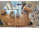 Aerial view of living room and vaulted ceiling, with hardwood floors, fireplace, and built-in bookshelves at 215 Settindown Ct, Roswell, GA 30075