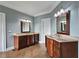 Main bathroom featuring double sink vanities, tile floors, and neutral paint at 215 Settindown Ct, Roswell, GA 30075