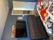 bedroom with Marvel comic decor, dresser and TV at 2208 Ginger Lake Ne Dr, Conyers, GA 30013