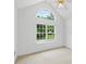 Bright bedroom featuring natural light, carpet flooring, and vaulted ceilings, creating a serene retreat at 504 Bradford Park Ct, Loganville, GA 30052