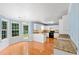 Bright kitchen with white cabinets, granite countertops, and stainless steel appliances at 504 Bradford Park Ct, Loganville, GA 30052