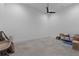 Unfinished basement with potential for customization and features a modern ceiling fan at 538 Main St, Palmetto, GA 30268