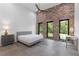 Modern bedroom with high ceilings, large windows, and minimalist decor at 538 Main St, Palmetto, GA 30268