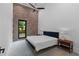 Bedroom with exposed brick wall and natural lighting at 538 Main St, Palmetto, GA 30268