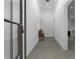 Bright hallway with polished concrete floors and a stylish light fixture at 538 Main St, Palmetto, GA 30268
