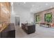 Spacious kitchen featuring a large island, stainless steel appliances, and exposed brick in an open layout at 538 Main St, Palmetto, GA 30268