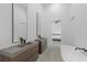 Main bathroom features a modern double vanity, a standing tub, and neutral color scheme at 538 Main St, Palmetto, GA 30268