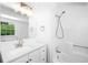 Bright bathroom featuring a shower-tub combo and modern fixtures at 191 High Creek Dr, Roswell, GA 30076