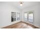 Bright room with vinyl floors and sliding patio door to backyard at 191 High Creek Dr, Roswell, GA 30076