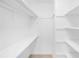 Bright walk-in closet with ample shelf space at 191 High Creek Dr, Roswell, GA 30076