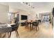 Open floor plan features hardwood floors and a bright living space with a dining area and balcony at 195 14Th Ne St # 1501, Atlanta, GA 30309