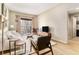 Bright living room with hardwood floors, comfortable seating, and a view of the city at 195 14Th Ne St # 1501, Atlanta, GA 30309