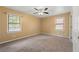 Bedroom featuring carpet flooring, ceiling fan, and natural light at 2117 Chestnut Hill Circle Cir, Decatur, GA 30032