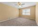 Bedroom featuring carpet flooring, ceiling fan and natural light at 2117 Chestnut Hill Circle Cir, Decatur, GA 30032