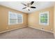 Bedroom featuring carpet flooring, ceiling fan and natural light at 2117 Chestnut Hill Circle Cir, Decatur, GA 30032