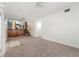 Spacious living room with carpet flooring, stairs to upper level, and neutral walls at 2117 Chestnut Hill Circle Cir, Decatur, GA 30032