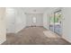 Neutral living room with carpet flooring, natural light, and sliding glass doors at 2117 Chestnut Hill Circle Cir, Decatur, GA 30032