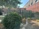 A backyard with a fence and overgrown bushes at 238 Walker Sw St # 22, Atlanta, GA 30313