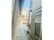 This exterior shot shows a pathway going through the property and some greenery at 238 Walker Sw St # 22, Atlanta, GA 30313