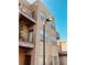 Multi-story condo features balconies, neutral stucco, large windows and a blue sky at 238 Walker Sw St # 22, Atlanta, GA 30313