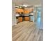 Kitchen features stainless steel appliances, wood cabinets, light gray walls and modern lighting at 238 Walker Sw St # 22, Atlanta, GA 30313