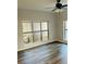 Inviting living room with windows offering natural light and wood look flooring at 238 Walker Sw St # 22, Atlanta, GA 30313