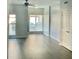 Spacious living room featuring wood floors, large windows, and a ceiling fan at 238 Walker Sw St # 22, Atlanta, GA 30313