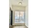 Entryway features window with blinds, light colored walls and updated flooring throughout at 238 Walker Sw St # 22, Atlanta, GA 30313