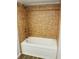This is a shower featuring ceramic tile at 238 Walker Sw St # 22, Atlanta, GA 30313