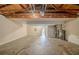 Unfinished basement with exposed ceiling and concrete floor at 446 Jaywood Dr, Stone Mountain, GA 30083