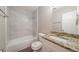 Bathroom with tile shower, granite countertop and white vanity at 446 Jaywood Dr, Stone Mountain, GA 30083