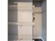 Walk-in closet with multiple levels of white wire shelving at 446 Jaywood Dr, Stone Mountain, GA 30083