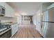 Modern kitchen with stainless steel appliances perfect for cooking, granite countertops and open to the living room at 446 Jaywood Dr, Stone Mountain, GA 30083