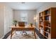 Bright home office featuring built-in shelving and ample desk space for productivity and organization at 446 Jaywood Dr, Stone Mountain, GA 30083