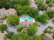 An aerial view of the community pool surrounded by mature trees and landscaping at 719 Mcgill Park Ne Ave, Atlanta, GA 30312