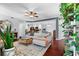 Open-concept living room with hardwood floors and a seamless flow to the kitchen at 719 Mcgill Park Ne Ave, Atlanta, GA 30312