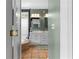 Main bathroom with double sink vanity, soaking tub, and tiled floors at 719 Mcgill Park Ne Ave, Atlanta, GA 30312