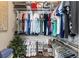 Organized walk-in closet with ample storage shelves and hanging space at 719 Mcgill Park Ne Ave, Atlanta, GA 30312